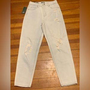 Light wash distressed boyfriend jeans.